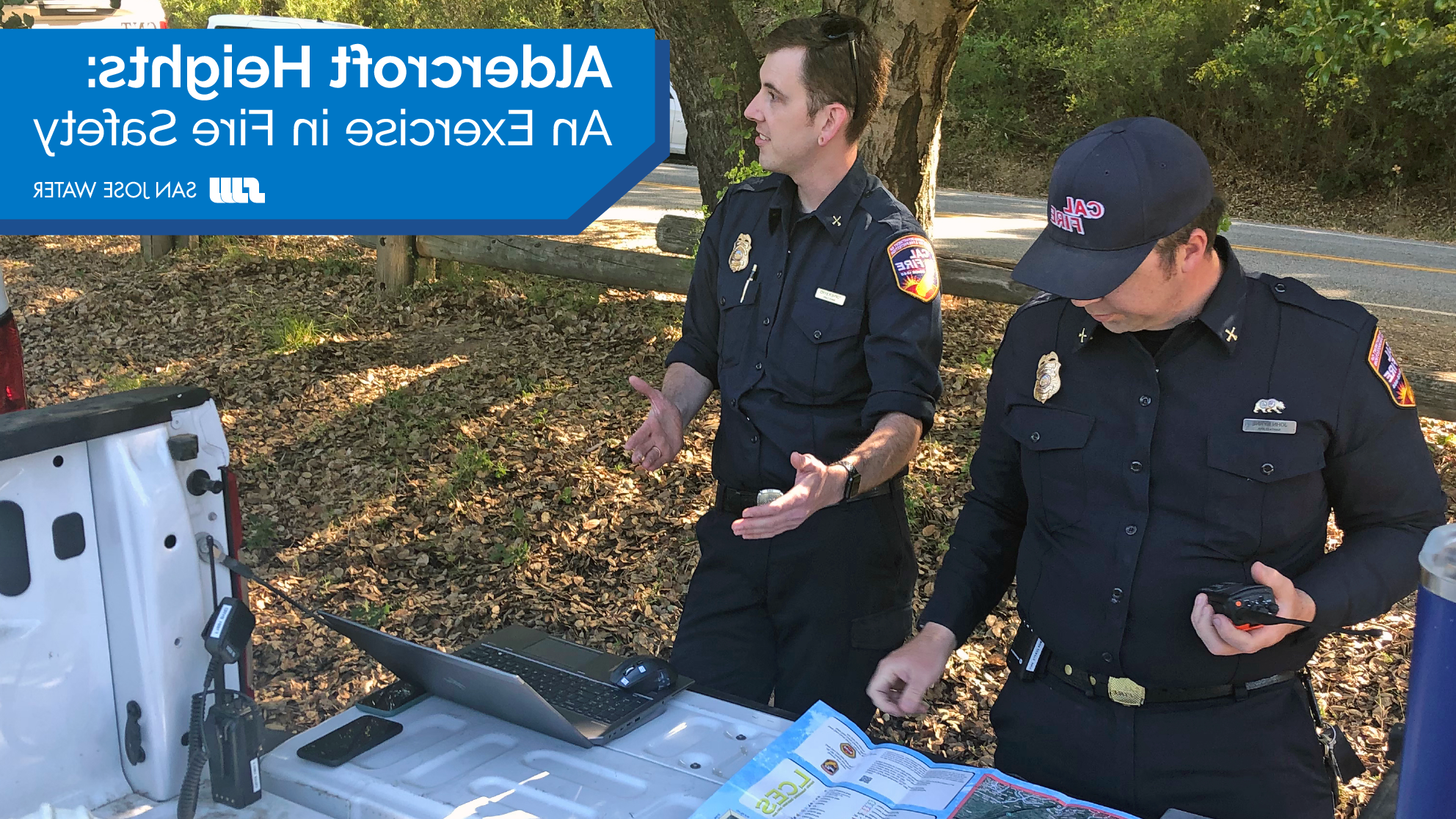 Police officers looking at map